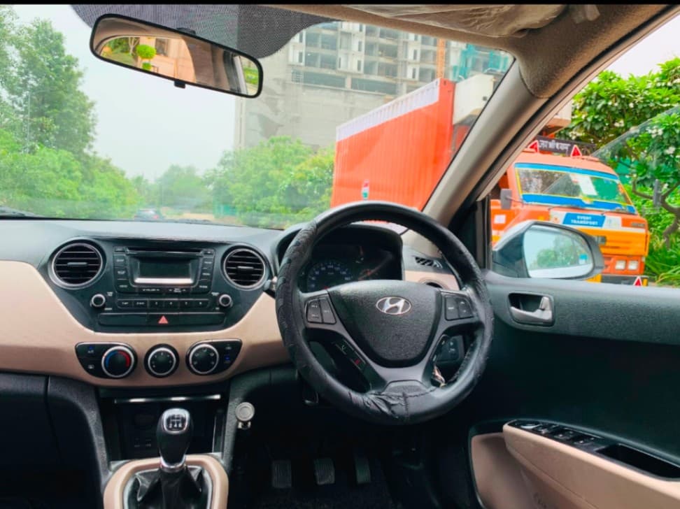 INTERIOR image for Xcent VTVT S(O) Met | Hooter